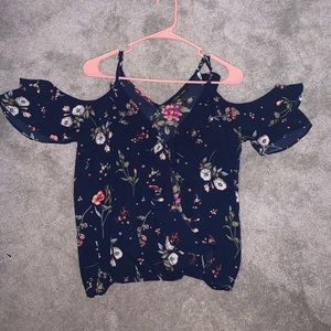 Navy blue blouse with peekaboo sleeves and ruffled front